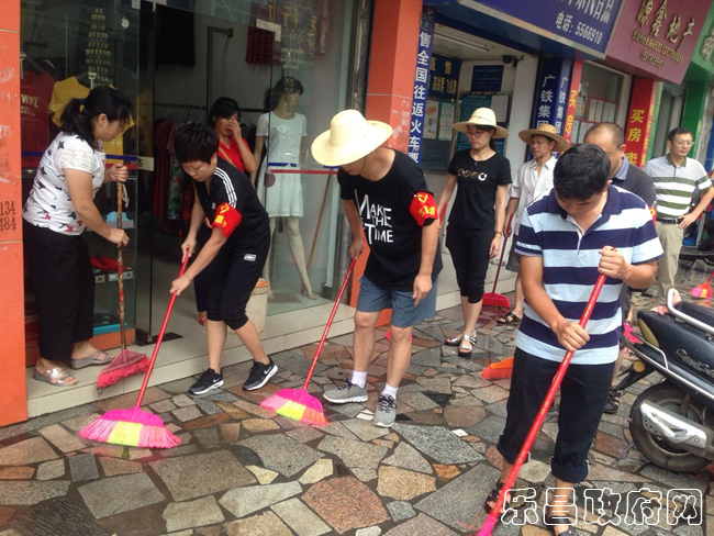 巩文第九小组参加卫生清洁志愿服务活动.jpg