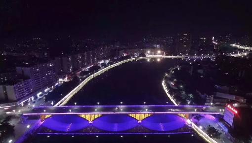 夜幕下的一江两岸悄然换装，照亮了每一位乐昌人的心！.jpg